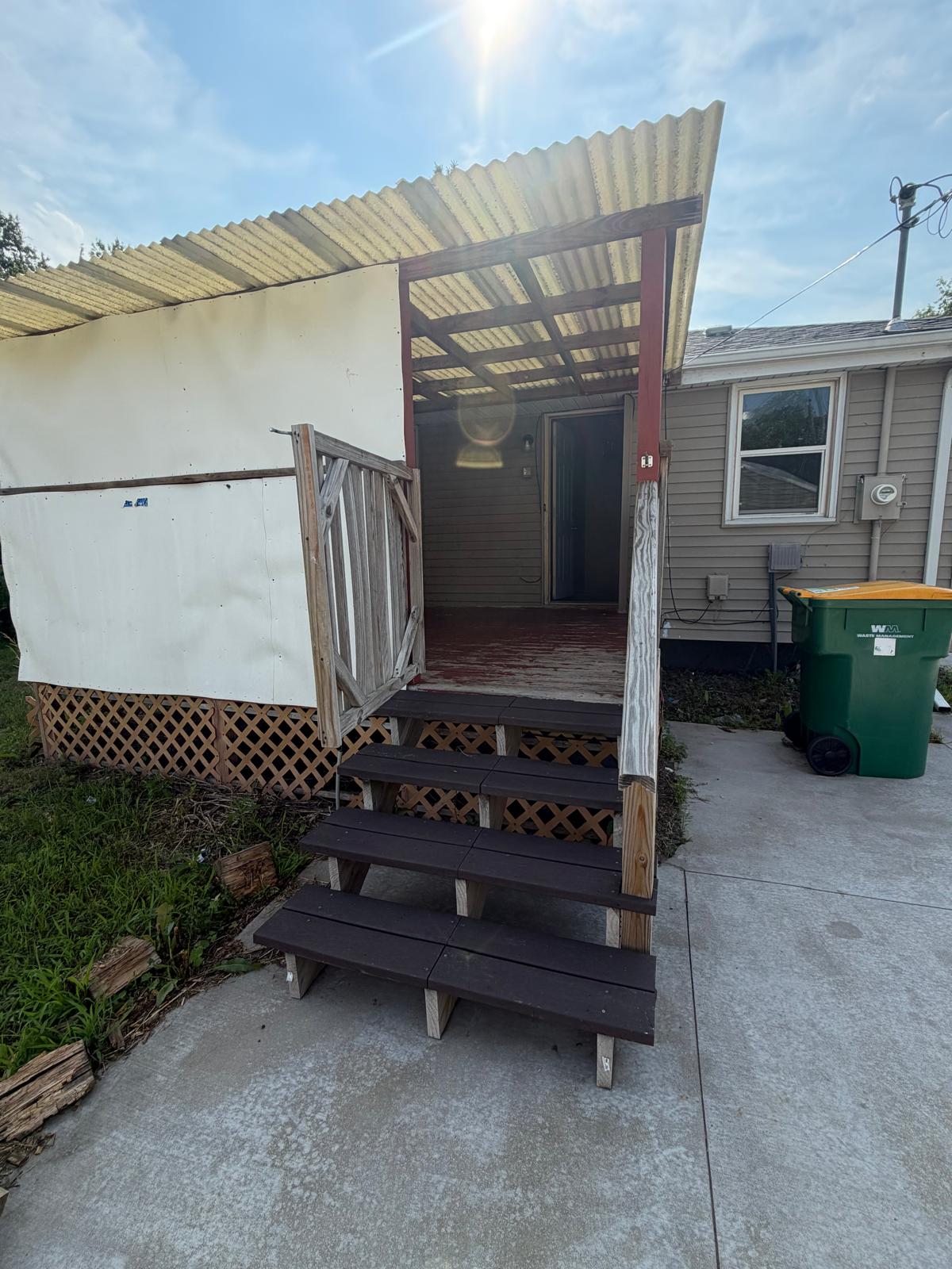 Covered entrance and accessible steps at STAR HOMES